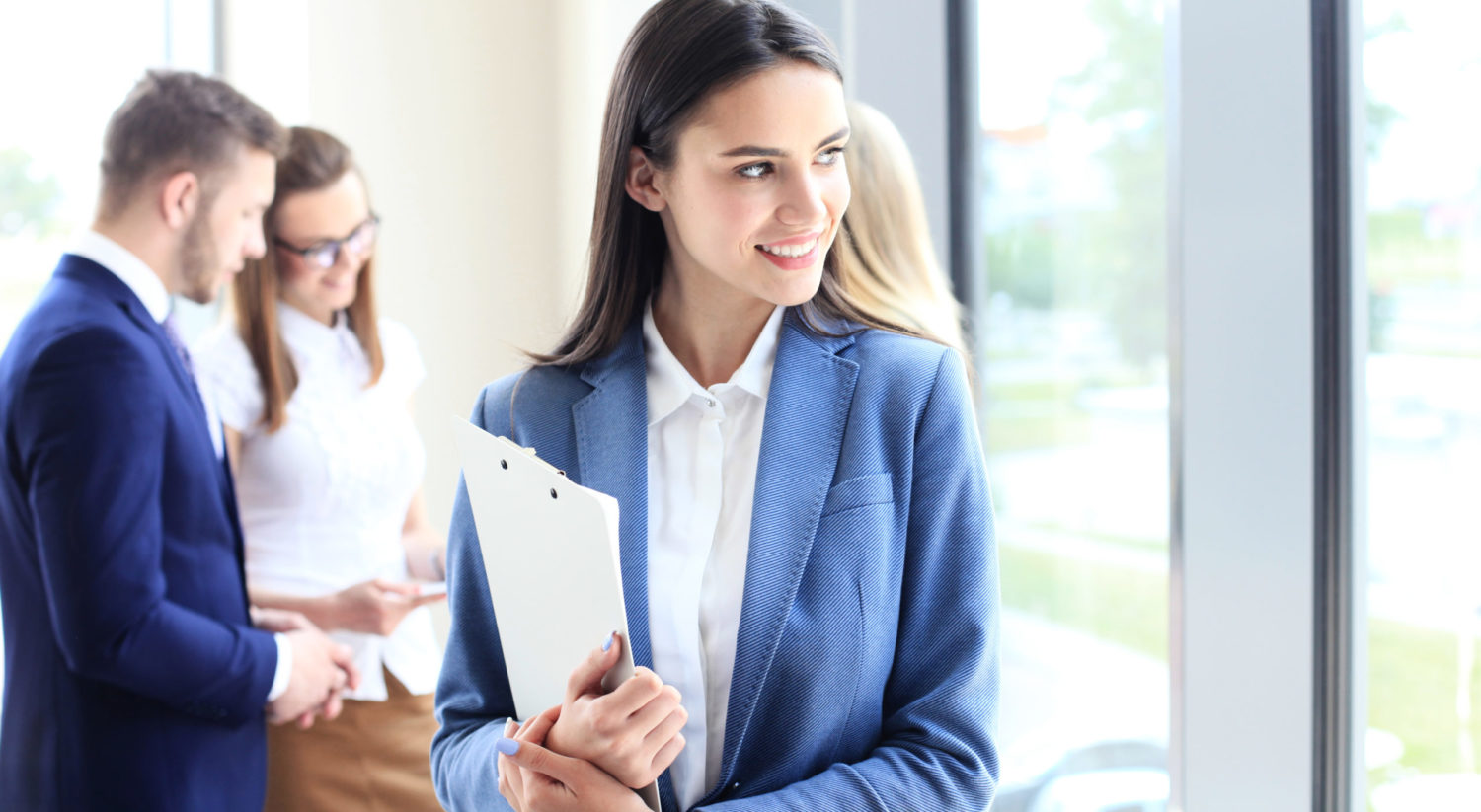 woman in business meeting smiling